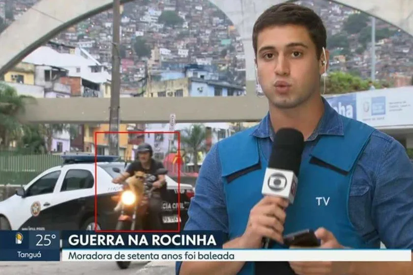 Gato de óculos escuros chama atenção em passagem da Rede Globo