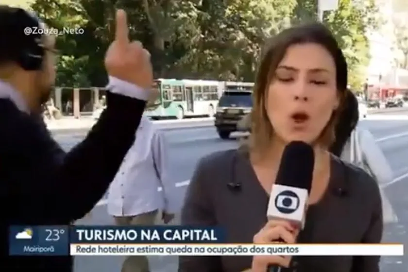 Homem mostra dedo do meio ao vivo na Globo e repórter reage!!