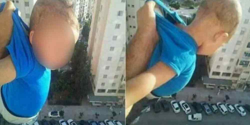 Homem é preso por balançar um bebê de uma janela no 15º andar apenas pela camiseta a fim de ganhar likes no Facebook