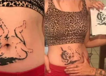 Polêmica!!Tatuadora posta fotos de tatuagem de bebê com faca encravada na cabeça na barriga de cliente