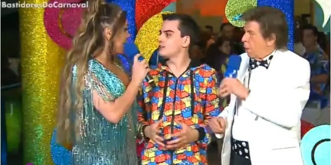 ( vídeo) Dudu Camargo agarra Simony e ao vivo tenta forçar beijo; apresntadores da RedeTV não gostaram
