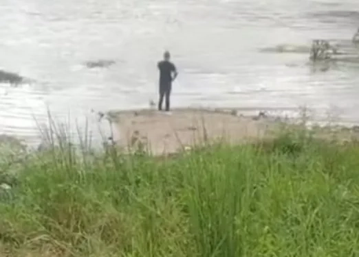 ( urgente) Mulher morre e homem segue desaparecido durante batismo no Rio Guandu