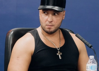 POLÊMICA NO RIO: PRÉ-CANDIDATO MC SMITH É ALVO DE CRÍTICAS POR MÚSICA QUE EXALTA LÍDER DO CV